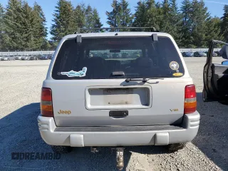 1997 Jeep Grand Cherokee Limited with VIN 1J4GZ78Y5VC598822, listed as a Copart auction lot 74306474 with 276,454 mi miles and Salvage Title. Bid and sale history available at carsss.com. Image 6.