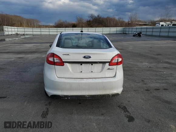 2012 Ford Fiesta S with VIN 3FADP4AJ6CM152349, listed as a Copart auction lot 42991095 with 121,675 mi miles and Non Repairable. Bid and sale history available at DreamBid. Image 6.