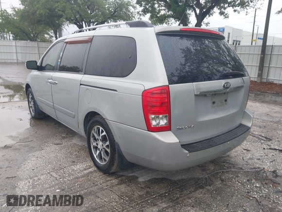 2014 Kia Sedona EX with VIN KNDMH4C74E6578326, listed as a IAAI auction lot 41990311 with 220,772 mi miles. Bid and sale history available at carsss.com. Image 3.