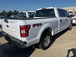 2018 Ford F-150 XL with VIN 1FTFW1E55JKE25772, listed as a IAAI auction lot 42882671 with 132,909 mi miles and . Bid and sale history available at DreamBid. Image 5.