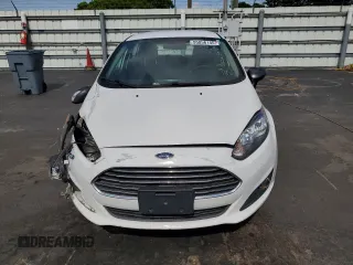 2019 Ford Fiesta SE z VIN 3FADP4EJ5KM106732, wystawiony jako Copart lot #55856145 z przebiegiem 79 778 mil mil oraz Szkody całkowita. Historia ofert i sprzedaży dostępna na DreamBid. Obrazek 5.