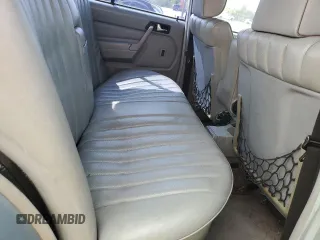 1986 Mercedes-Benz 190 with VIN WDBDA24D4GF155793, listed as a Copart auction lot 68599054 with 193,233 mi miles and Clean Title. Bid and sale history available at carsss.com. Image 10.