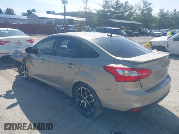 2015 Ford Focus SE with VIN 1FADP3F24FL260387, listed as a IAAI auction lot 41990194 with 80,673 mi miles. Bid and sale history available at carsss.com. Image 3.