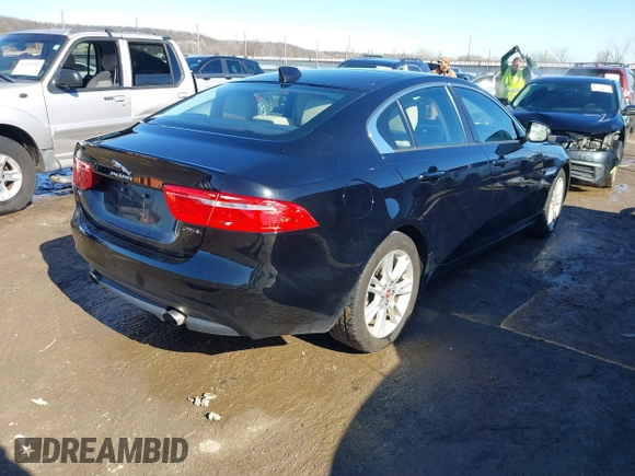 2018 Jaguar XE 25t Premium with VIN SAJAD4FX3JCP20138, listed as a IAAI auction lot 41441120 with 52,795 mi miles. Bid and sale history available at carsss.com. Image 4.