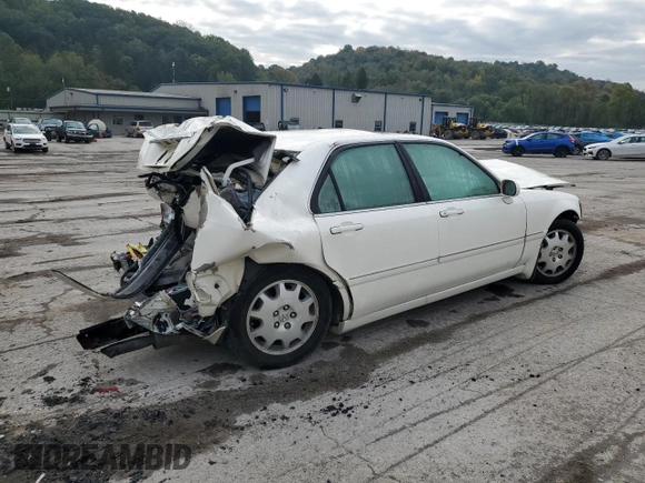 2004 Acura RL w/Navigation System with VIN JH4KA96684C001230, listed as a Copart auction lot 74801074 with 151,266 mi miles and Salvage Title. Bid and sale history available at carsss.com. Image 3.
