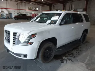 2020 Chevrolet Tahoe Commercial with VIN 1GNLCDEC8LR283902, listed as a IAAI auction lot 41670895 with 91,508 mi miles. Bid and sale history available at carsss.com. Image 18.