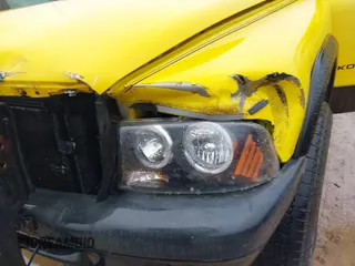 2004 Dodge Dakota Sport z VIN 1D7HG38N64S752270, wystawiony jako IAAI lot #41555599 z przebiegiem 121 283 mil mil oraz . Historia ofert i sprzedaży dostępna na DreamBid. Obrazek 14.