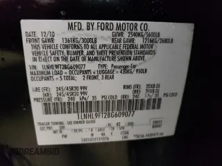 2011 Lincoln MKS EcoBoost with VIN 1LNHL9FT2BG609077, listed as a Copart auction lot 59341025 with 184,591 mi miles and Salvage title. Bid and sale history available at DreamBid. Image 12.