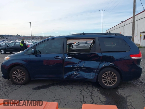 2011 Toyota Sienna XLE AAS with VIN 5TDYK3DCXBS113103, listed as a IAAI auction lot 41505972 with 170,919 mi miles and . Bid and sale history available at DreamBid. Image 14.