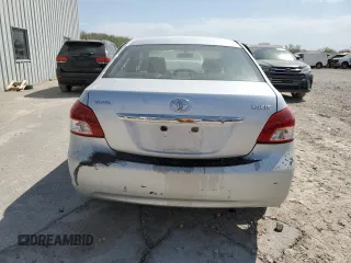2009 Toyota Yaris with VIN JTDBT903391300394, listed as a Copart auction lot 53392945 with 227,210 mi miles and Salvage Title. Bid and sale history available at DreamBid. Image 6.