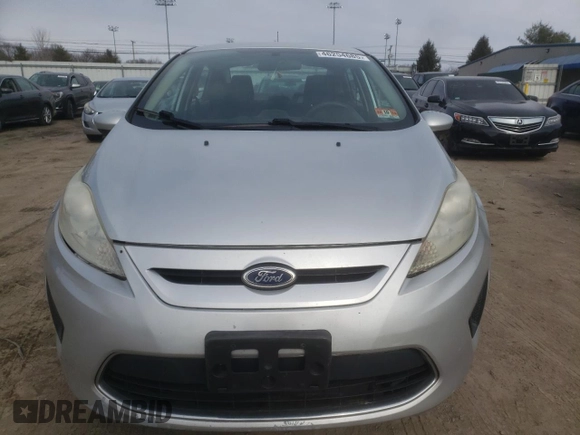 2012 Ford Fiesta SE with VIN 3FADP4BJ3CM114043, listed as a Copart auction lot 46254685 with 58,457 mi miles and Clean Title. Bid and sale history available at DreamBid. Image 5.