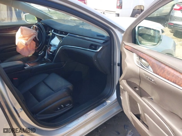 2016 Cadillac XTS Luxury Collection with VIN 2G61M5S30G9148245, listed as a IAAI auction lot 39192285 with 36,480 mi miles. Bid and sale history available at carsss.com. Image 5.