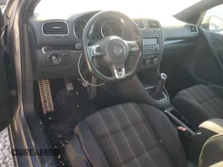 2011 Volkswagen GTI w/Sunroof with VIN WVWEV7AJXBW074579, listed as a Copart auction lot 70604034 with 117,760 mi miles and Salvage Title. Bid and sale history available at carsss.com. Image 8.