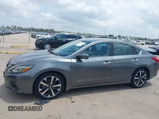 2016 Nissan Altima SR with VIN 1N4AL3APXGC227638, listed as a IAAI auction lot 42079982 with 167,303 mi miles and . Bid and sale history available at carsss.com. Image 14.