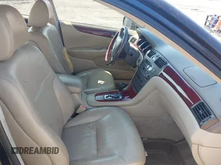 2002 Lexus ES 300 with VIN JTHBF30G020052297, listed as a IAAI auction lot 42630300 with 215,488 mi miles and . Bid and sale history available at DreamBid. Image 5.