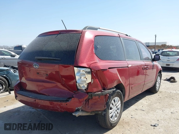 2012 Kia Sedona LX with VIN KNDMG4C70C6463190, listed as a IAAI auction lot 41781336 with 179,860 mi miles. Bid and sale history available at carsss.com. Image 4.
