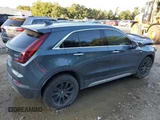 2019 Cadillac XT4 FWD Premium Luxury z VIN 1GYFZCR47KF123621, wystawiony jako Copart lot #69766894 z przebiegiem 68 191 mil mil oraz Szkody całkowita. Historia ofert i sprzedaży dostępna na DreamBid. Obrazek 3.