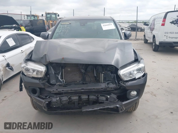 2023 Toyota Tacoma SR5 z VIN 3TMAZ5CN8PM201702, wystawiony jako IAAI lot #42060855 z przebiegiem 17 705 mil mil oraz . Historia ofert i sprzedaży dostępna na DreamBid. Obrazek 13.