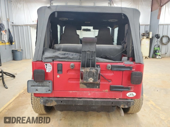 2004 Jeep Wrangler SE с VIN 1J4FA29164P771472, выставлен на аукционе Copart как лот 48162335 с пробегом 175 764 миль миль и Списание • Salvage title. История ставок и продаж доступна на DreamBid. Изображение 6.
