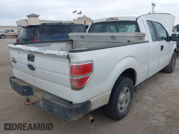 2009 Ford F-150 STX with VIN 1FTRX12W59KB75341, listed as a IAAI auction lot 42045577 with 195,427 mi miles and . Bid and sale history available at DreamBid. Image 4.