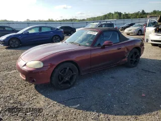 2003 Mazda MX-5 Miata Cloth with VIN JM1NB353630309397, listed as a Copart auction lot 65026285 with 233,644 mi miles and Salvage title. Bid and sale history available at DreamBid. Image 1.