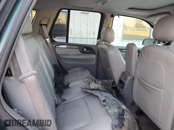 2005 GMC Envoy SLT with VIN 1GKDS13S652329610, listed as a Copart auction lot 76384914 with Not Provided miles and Salvage Title. Bid and sale history available at DreamBid. Image 11.
