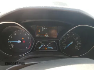 2017 Ford Focus SE z VIN 1FADP3F22HL312683, wystawiony jako Copart lot #53385315 z przebiegiem 88 751 mil mil oraz Szkoda całkowita • Salvage title. Historia ofert i sprzedaży dostępna na DreamBid. Obrazek 9.