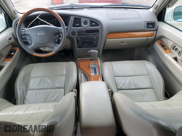 2003 Infiniti QX4 with VIN JNRDR09X83W251941, listed as a Copart auction lot 71044774 with 162,214 mi miles and Salvage Title. Bid and sale history available at DreamBid. Image 8.