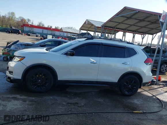 2017 Nissan Rogue SV with VIN 5N1AT2MT4HC886941, listed as a IAAI auction lot 41931973 with 134,249 mi miles and . Bid and sale history available at DreamBid. Image 14.
