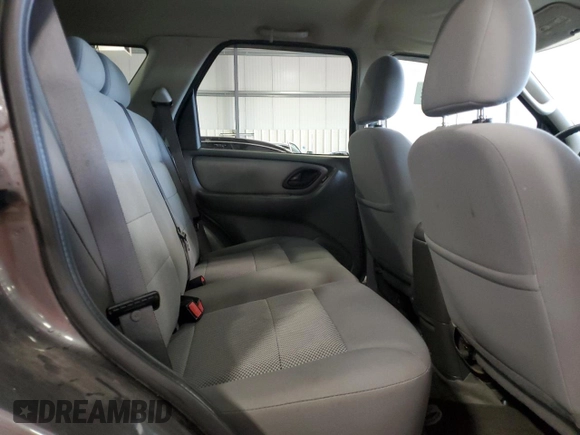 2005 Ford Escape XLT with VIN 1FMYU93135KD88798, listed as a Copart auction lot 69311714 with 81,126 mi miles and Salvage Title. Bid and sale history available at carsss.com. Image 11.