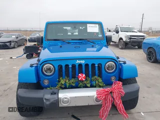 2014 Jeep Wrangler Arctic z VIN 1C4GJWBG3EL313350, wystawiony jako IAAI lot #41442520 z przebiegiem Nie podano mil oraz . Historia ofert i sprzedaży dostępna na DreamBid. Obrazek 12.