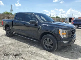 2022 Ford F-150 XL with VIN 1FTFW1E82NFC33590, listed as a Copart auction lot 61806045 with 53,477 mi miles and Salvage title. Bid and sale history available at DreamBid. Image 4.