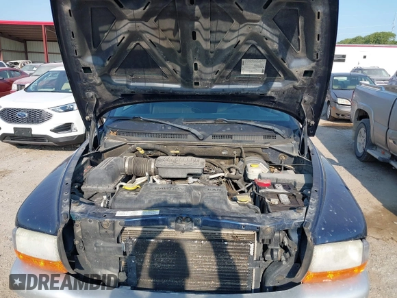 2004 Dodge Dakota SLT with VIN 1D7HG48N14S610012, listed as a IAAI auction lot 39853794 with 158,998 mi miles and . Bid and sale history available at carsss.com. Image 10.