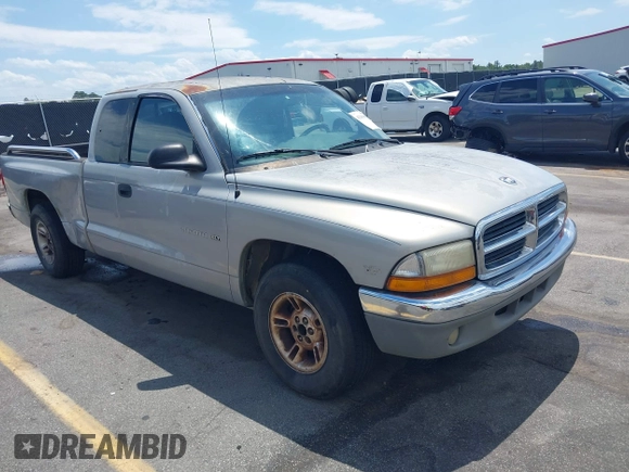 1999 Dodge Dakota SLT z VIN 1B7GL22X9XS258964, wystawiony jako IAAI lot #42309862 z przebiegiem 177 561 mil mil oraz . Historia ofert i sprzedaży dostępna na DreamBid. Obrazek 1.