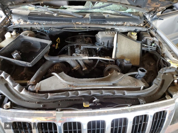 2001 Jeep Grand Cherokee Laredo with VIN 1J4GX48S61C603035, listed as a Copart auction lot 50267945 with 320,564 mi miles and Salvage title. Bid and sale history available at DreamBid. Image 12.