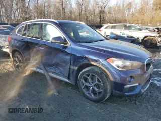 2018 BMW X1 xDrive28i with VIN WBXHT3C32J3H31391, listed as a Copart auction lot 88584855 with 32,441 mi miles and Salvage Title. Bid and sale history available at DreamBid. Image 4.
