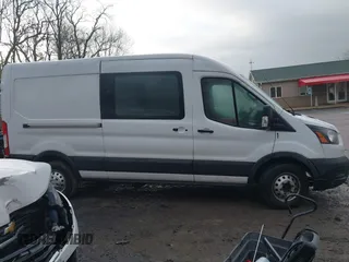 2021 Ford Transit Cargo with VIN 1FTBR2C82MKA29523, listed as a IAAI auction lot 41069336 with 195,397 mi miles and . Bid and sale history available at DreamBid. Image 13.