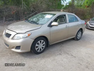 2009 Toyota Corolla with VIN 2T1BU40E99C122004, listed as a IAAI auction lot 42251061 with 210,193 mi miles and . Bid and sale history available at DreamBid. Image 2.