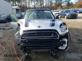 2016 MINI Countryman S with VIN WMWZC5C55GWU22112, listed as a Copart auction lot 82132654 with 60,210 mi miles and Salvage Title. Bid and sale history available at DreamBid. Image 5.
