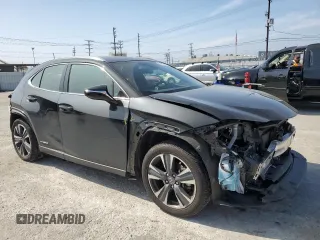 2022 Lexus UX with VIN JTHX9JBH1N2056617, listed as a Copart auction lot 47960103 with 28,948 mi miles. Bid and sale history available at carsss.com. Image 4.