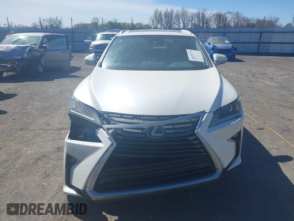 2018 Lexus RX 350 z VIN 2T2BZMCAXJC144930, wystawiony jako IAAI lot #41857778 z przebiegiem 108 191 mil mil oraz . Historia ofert i sprzedaży dostępna na DreamBid. Obrazek 12.
