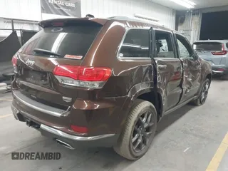2014 Jeep Grand Cherokee Summit with VIN 1C4RJFJT6EC346575, listed as a IAAI auction lot 41881795 with 148,941 mi miles and . Bid and sale history available at DreamBid. Image 4.