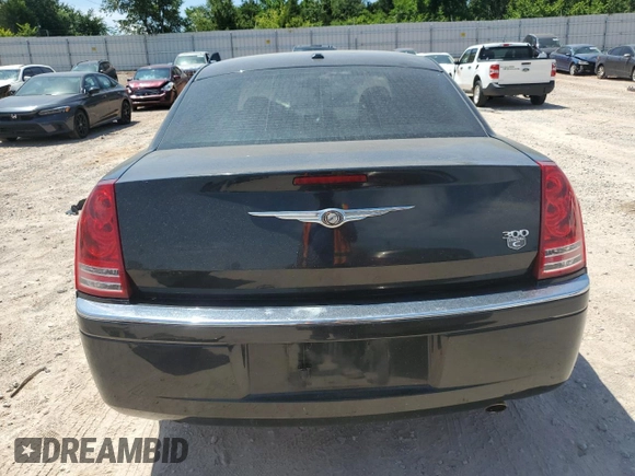 2009 Chrysler 300 with VIN 2C3KA63T39H580730, listed as a Copart auction lot 64933564 with 155,403 mi miles and Salvage Title. Bid and sale history available at carsss.com. Image 6.