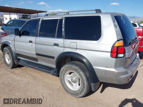 2001 Mitsubishi Montero ES z VIN JA4LS21HX1P041052, wystawiony jako IAAI lot #42084599 z przebiegiem 239 095 mil mil oraz . Historia ofert i sprzedaży dostępna na DreamBid. Obrazek 3.