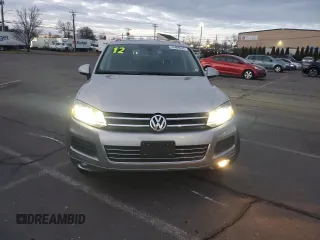 2012 Volkswagen Touareg with VIN WVGFG9BPXCD004442, listed as a Copart auction lot 41466935 with 98,956 mi miles and Clean title. Bid and sale history available at DreamBid. Image 5.