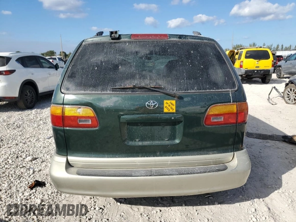 2000 Toyota Sienna LE z VIN 4T3ZF13CXYU287503, wystawiony jako Copart lot #43746115 z przebiegiem Nie podano mil oraz Szkoda całkowita • Salvage title. Historia ofert i sprzedaży dostępna na DreamBid. Obrazek 6.