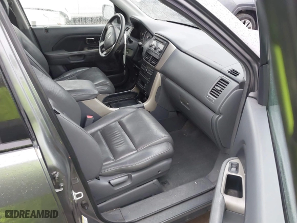 2007 Honda Pilot EX-L with VIN 5FNYF28617B024003, listed as a IAAI auction lot 41479218 with 201,868 mi miles. Bid and sale history available at carsss.com. Image 5.