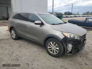 2016 Kia Sorento LX with VIN 5XYPG4A57GG011660, listed as a Copart auction lot 51749855 with 127,729 mi miles and Salvage Title. Bid and sale history available at carsss.com. Image 4.