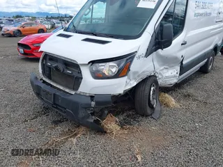 2022 Ford Transit Cargo with VIN 1FTBR1C83NKA78404, listed as a IAAI auction lot 40335158 with 31,273 mi miles and . Bid and sale history available at DreamBid. Image 6.