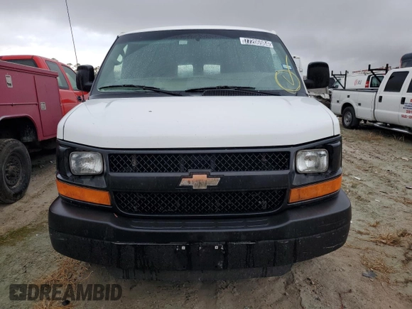2014 Chevrolet Express Cargo Van with VIN 1GCWGGBA3E1213546, listed as a Copart auction lot 77206984 with 309,311 mi miles and Clean Title. Bid and sale history available at carsss.com. Image 5.